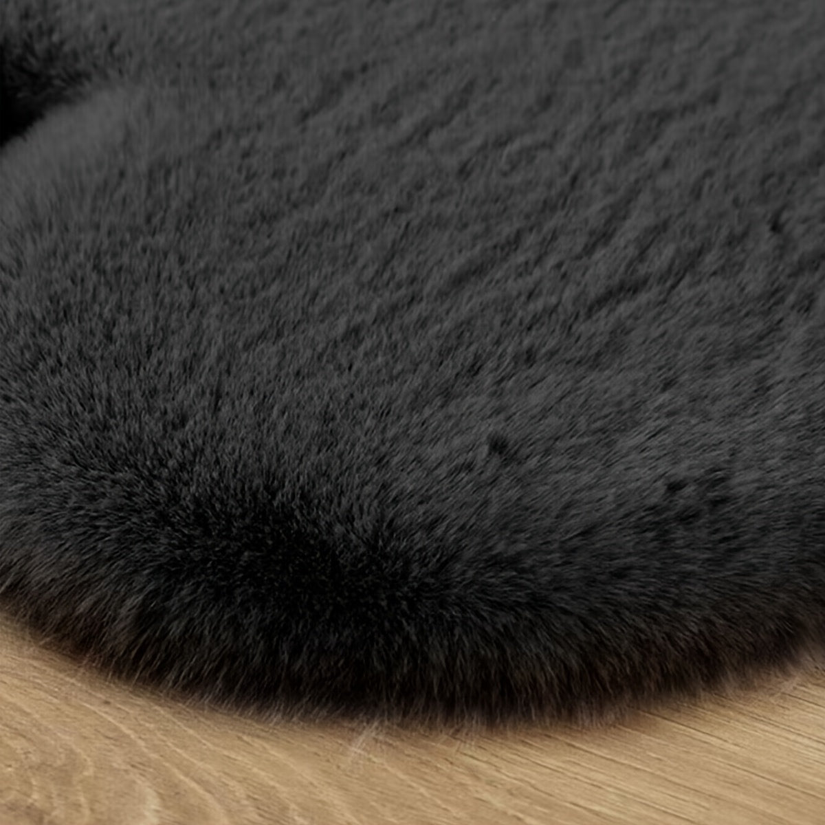 A Uniquely Shaped Solid Color Rug Made of Faux Rabbit Fur Material, Featuring a Fluffy